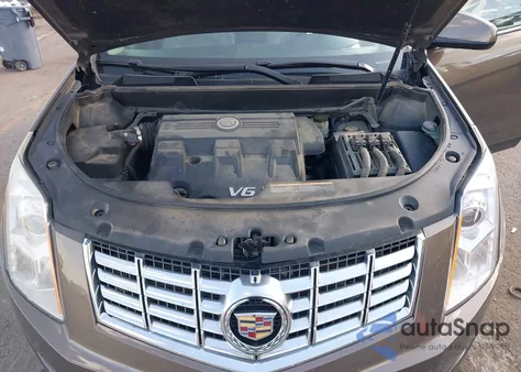 2014 Cadillac Srx Luxury Collection z USA, uszkodzony, nr VIN 3GYFNEE35ES610109